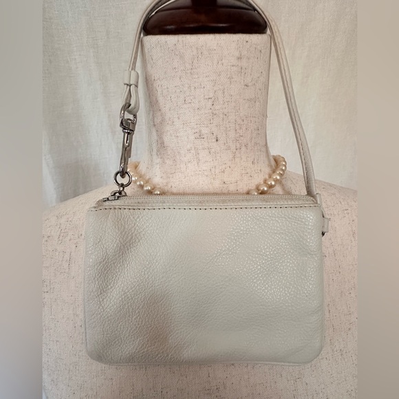COACH!! Signature C’s Perforation Wristlet Parchment White - Picture 2 of 6